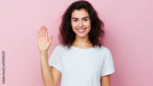 Full body portrait of satisfied young person arm palm waving hello hi isolated on pink color background