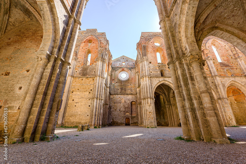 Transept elevation of abandoned San Galgano Abbey, a Cistercian monastery from the Middle Ages built in Chiusdino, a Tuscany countryside village in Central Italy photo