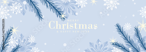 Pale blue New Year and Christmas winter card, poster, banner with Christmas tree branches, snowflakes and stars. photo