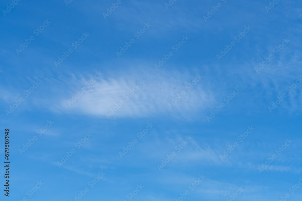 Beautiful blue sky with strange shape of clouds in the morning or evening used as natural background texture in decorative art work Beautiful blue sky with strange shape of clouds in the morning or evening used as natural background texture in decorative art work