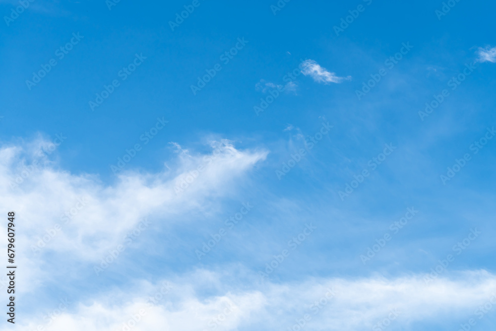 Beautiful blue sky with strange shape of clouds in the morning or evening used as natural background texture in decorative art work Beautiful blue sky with strange shape of clouds in the morning or evening used as natural background texture in decorative art work