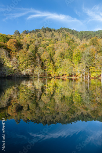 Yedigöller or Seven Lakes National Park is in Turkey.
Reflection of a lake with trees and blue sky in autumn colors. Yedigöller, Bolu.
Yedigöller in autumn. Bolu, Türkiye.