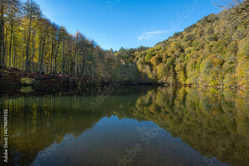 Yedigöller or Seven Lakes National Park is in Turkey.
Reflection of a lake with trees and blue sky in autumn colors. Yedigöller, Bolu.
Yedigöller in autumn. Bolu, Türkiye.