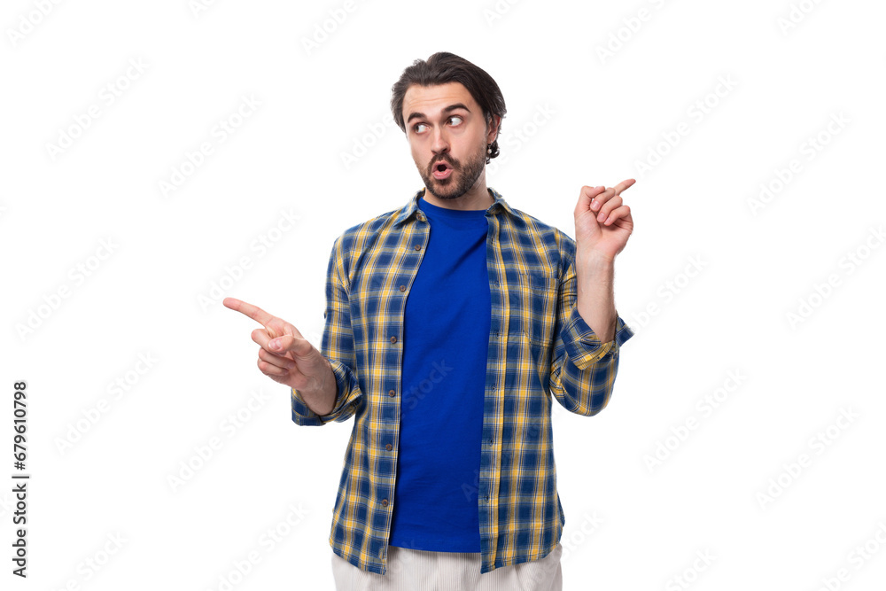 handsome energetic positive young European brunette man with a well-groomed beard and mustache dressed casually handsome energetic positive young European brunette man with a well-groomed beard and mustache dressed casually