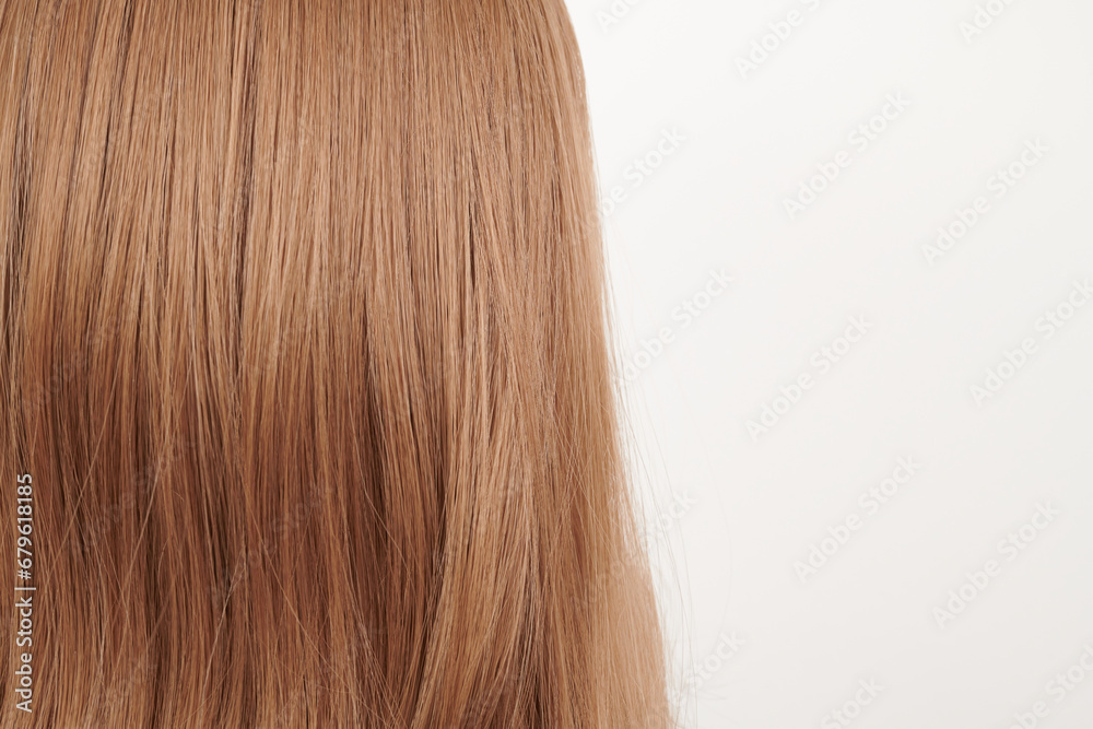 Natural looking shiny hair, brown curls isolated on white background with copy space Natural looking shiny hair, brown curls isolated on white background with copy space