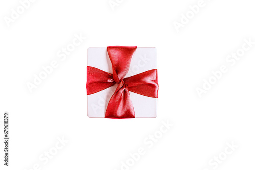 White gift box with a red bow on a white background