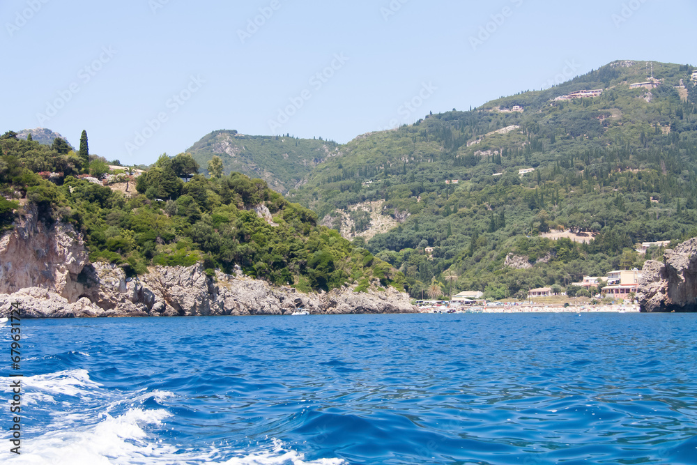 Mediterranean sea shore with mountains, Corfu