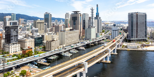 Kobe skyline from above with port and elevated road panorama in Japan