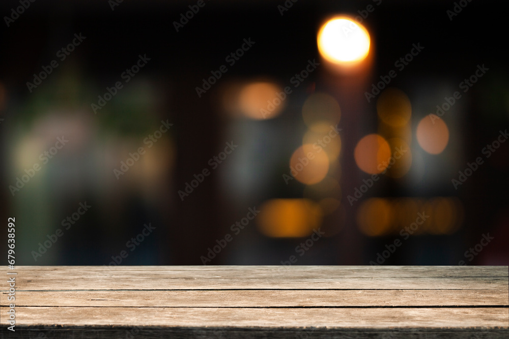 empty wooden table to showcase your product on blurred golden bokeh cafe background empty wooden table to showcase your product on blurred golden bokeh cafe background