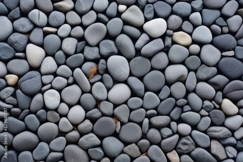 broad view of flat slate pebbles creating a smooth texture