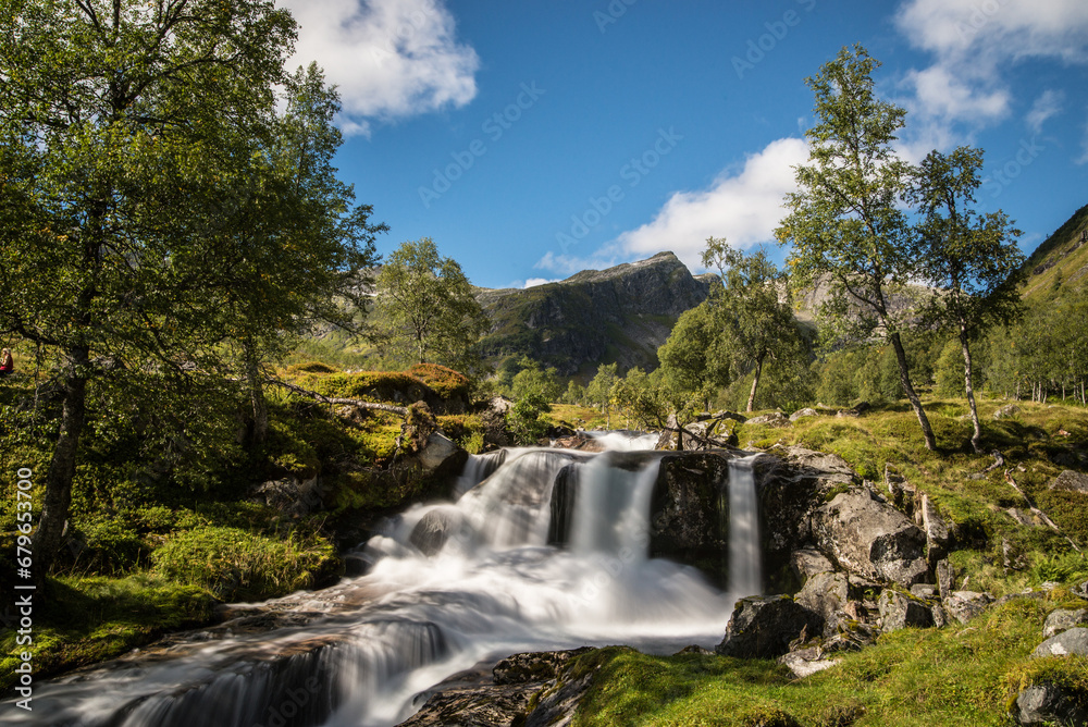Waterfall in a valley in western Norway. Summer. Waterfall in a valley in western Norway. Summer.