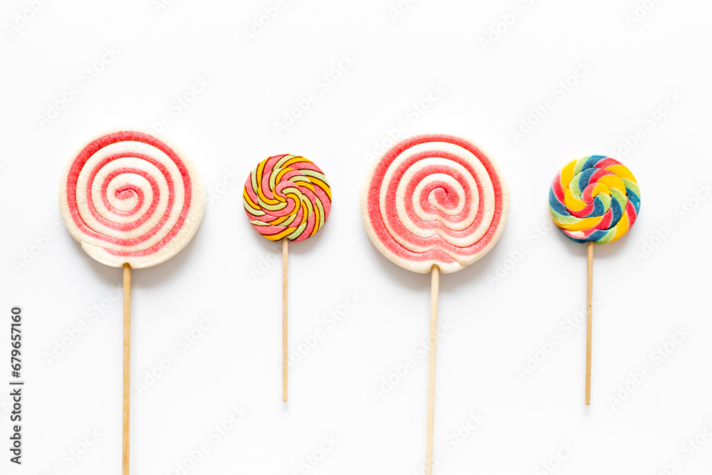 Food pattern. Many colorful lollipops. Sweet food and candies background Food pattern. Many colorful lollipops. Sweet food and candies background