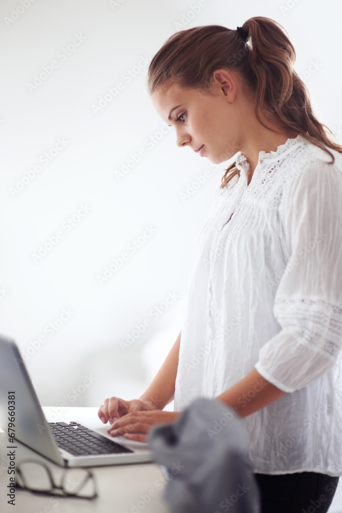College student, reading and morning in home with laptop, online communication and check email. Computer, remote work and woman typing on keyboard or planning schedule, education and elearning College student, reading and morning in home with laptop, online communication and check email. Computer, remote work and woman typing on keyboard or planning schedule, education and elearning