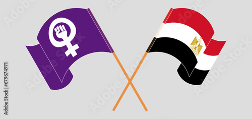 Crossed and waving flags of Feminism and Egypt
