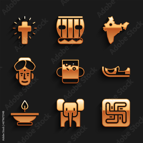 Set Cup of tea and leaf, Elephant, Hindu swastika, Indian shoes, Aroma lamp, man, map and Christian cross icon. Vector