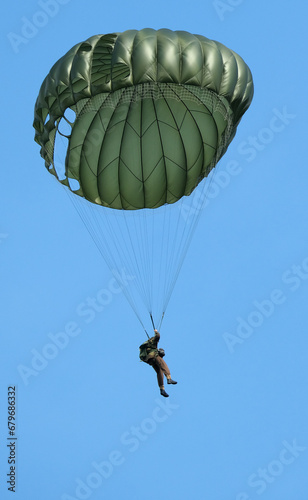 Victory Show. Leicester, UK. Renacted parachute jump with round military style parchutes. 