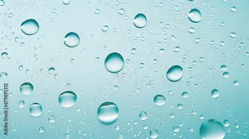  a close up of water droplets on a glass surface with a blue sky in the background of the image.