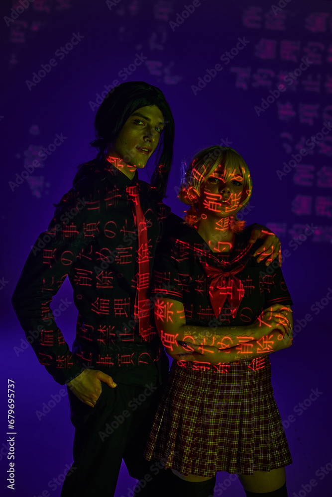 anime style students in colorful neon projection of hieroglyphs on blue indigo backdrop, cosplayers