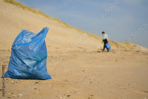 Bag of rubbish on a beach
