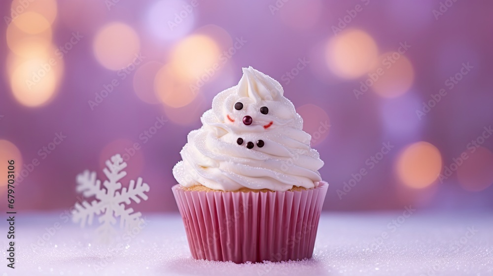 a cupcake with white frosting and a snowflake on a purple background with a snowflake in the foreground. a cupcake with white frosting and a snowflake on a purple background with a snowflake in the foreground.