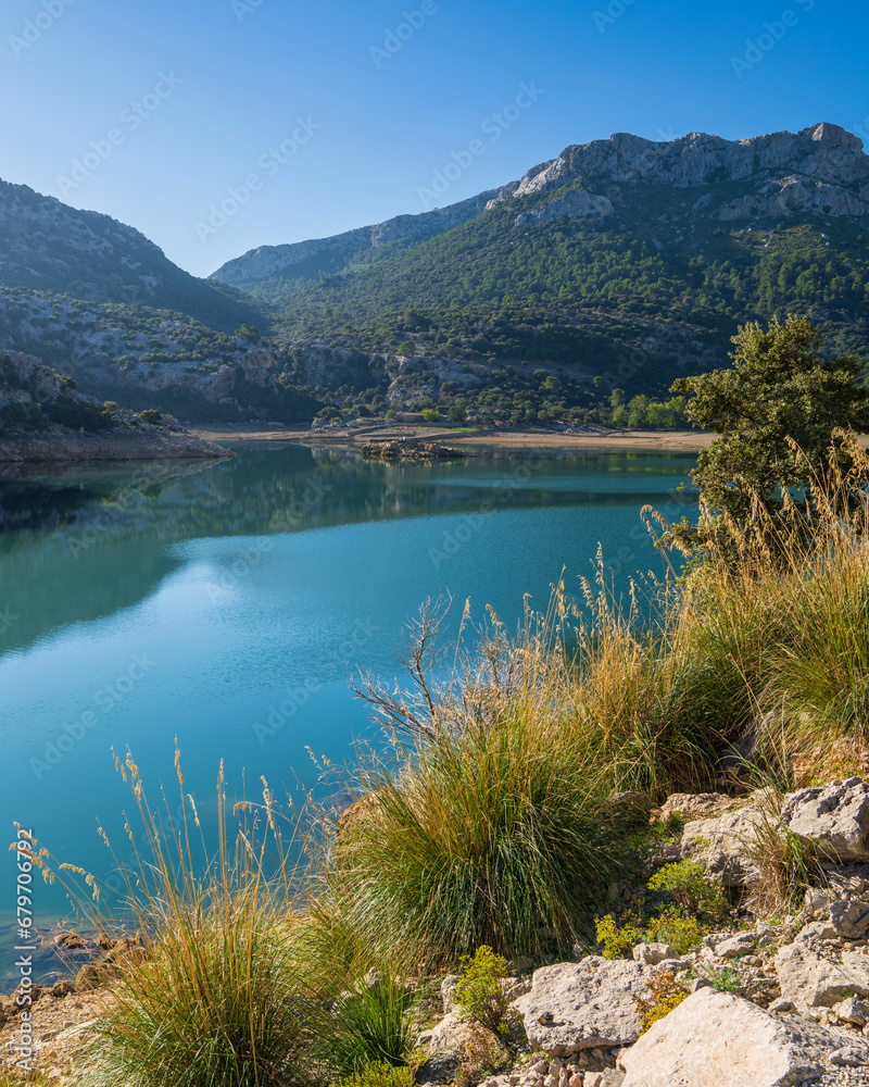 A small lake, Torrent de Gorg Blau, located among the rocks in Mallorca, Spain