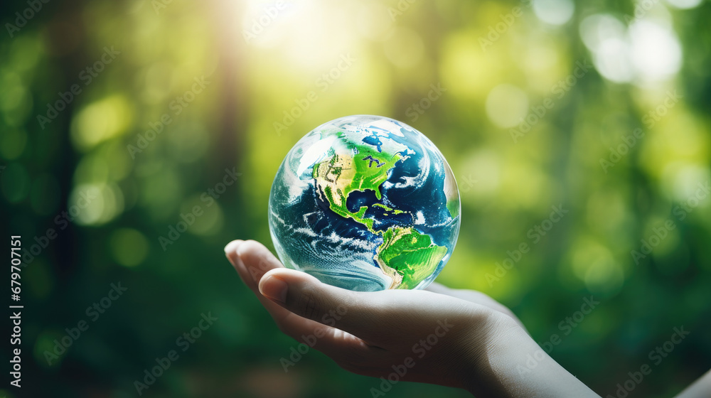 Hands holding Earth in a hand in the forest, as a symbol for environmental protection and care of the planet. Earth Day environment concept - Generative AI Hands holding Earth in a hand in the forest, as a symbol for environmental protection and care of the planet. Earth Day environment concept - Generative AI