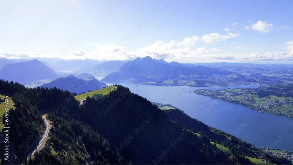 spectacular high-altitude view of the city and the Lake of Lucerne from Mount Rigi featuring Mount Pilatus and Stanserhorn Mountain in a breathtaking alpine panorama
spectacular high-altitude view of the city and the Lake of Lucerne from Mount Rigi featuring Mount Pilatus and Stanserhorn Mountain in a breathtaking alpine panorama