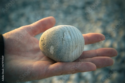 round rock in the hand photo