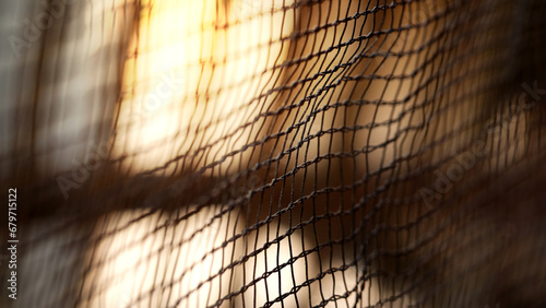 Abstract background of metal netting, close-up, selective focus photo