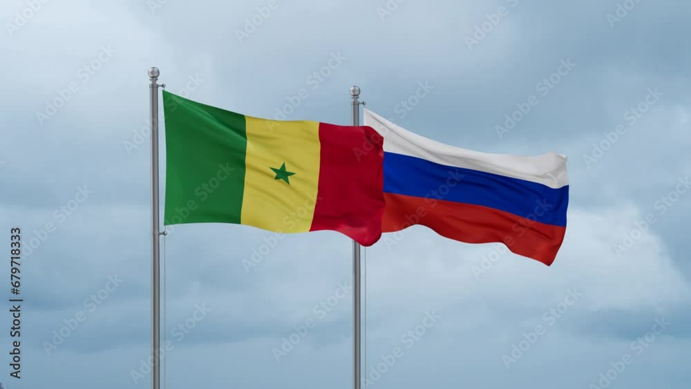 Russian Federation and Senegal flag waving together on cloudy sky, endless seamless loop Russian Federation and Senegal flag waving together on cloudy sky, endless seamless loop