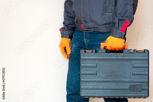  Hand with a case. gloves, tool box, person photo