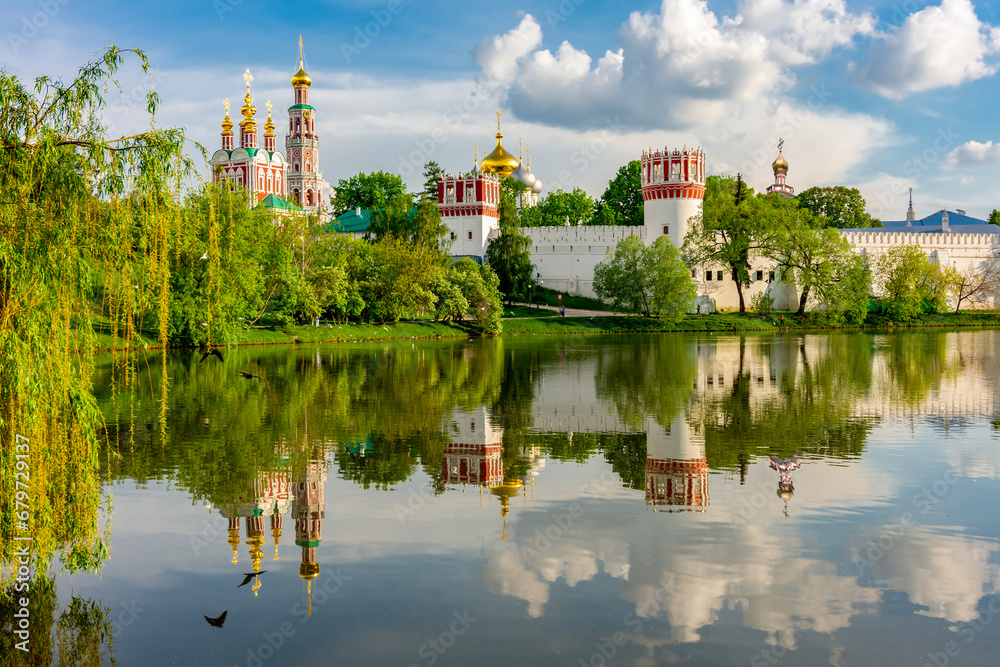 Novodevichy Convent (New maiden's monastery) reflected in pond, Moscow, Russia