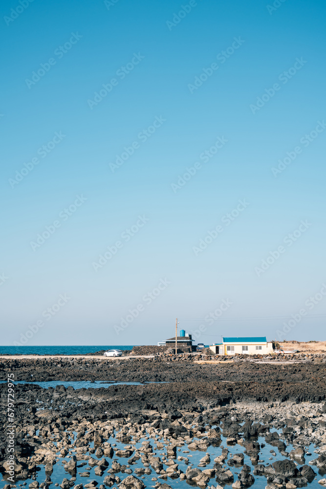 Stone beach and house in Jeju Island, Korea