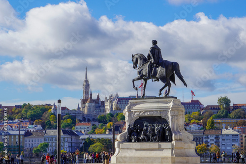 Budapest, Hungary, November 3, 2023:Statue of Count Gyula Andrássy on Kossuth Square with the Buda quay in the background on a sunny day
 photo