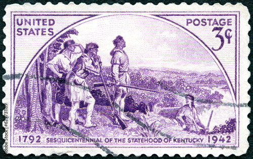 USA - 1942: shows Daniel Boone and Three Frontiersmen from mural by Gilbert White, Kentucky Statehood Issue, 1942 photo