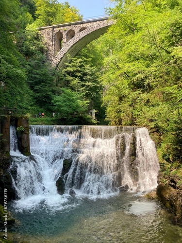 Šum waterfall at the Vintgar gorge - a popular tourist destination to enjoy a hike along the Radovna river