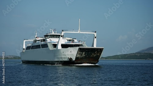 Car ferry boat in Greece linking the island Corfu to mainland transporting goods and vehicles