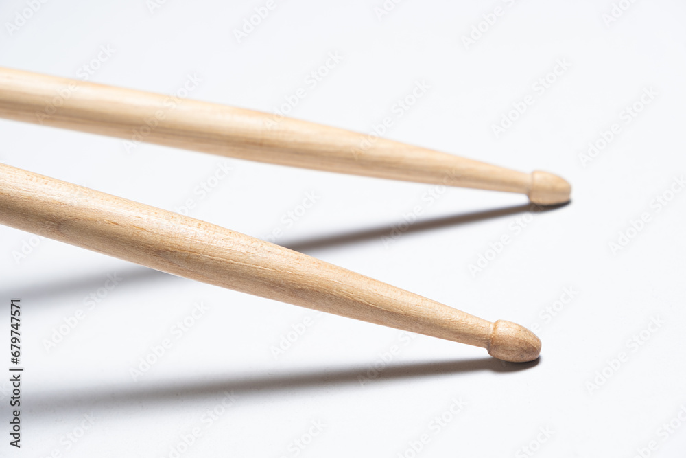 Wooden drum sticks on white background. Wooden drum sticks on white background.