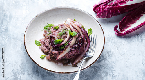 Wallpaper Mural Risotto with radicchio, pancetta and red  wine, winter Nord Italy dish. Radicchio chicory (Radicchio rosso di Treviso, Veneto) on the white table. Winter recipes from the north Italy
 Torontodigital.ca