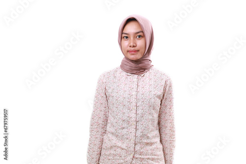 Young asian muslim girl standing while looking at the camera. Isolated on white