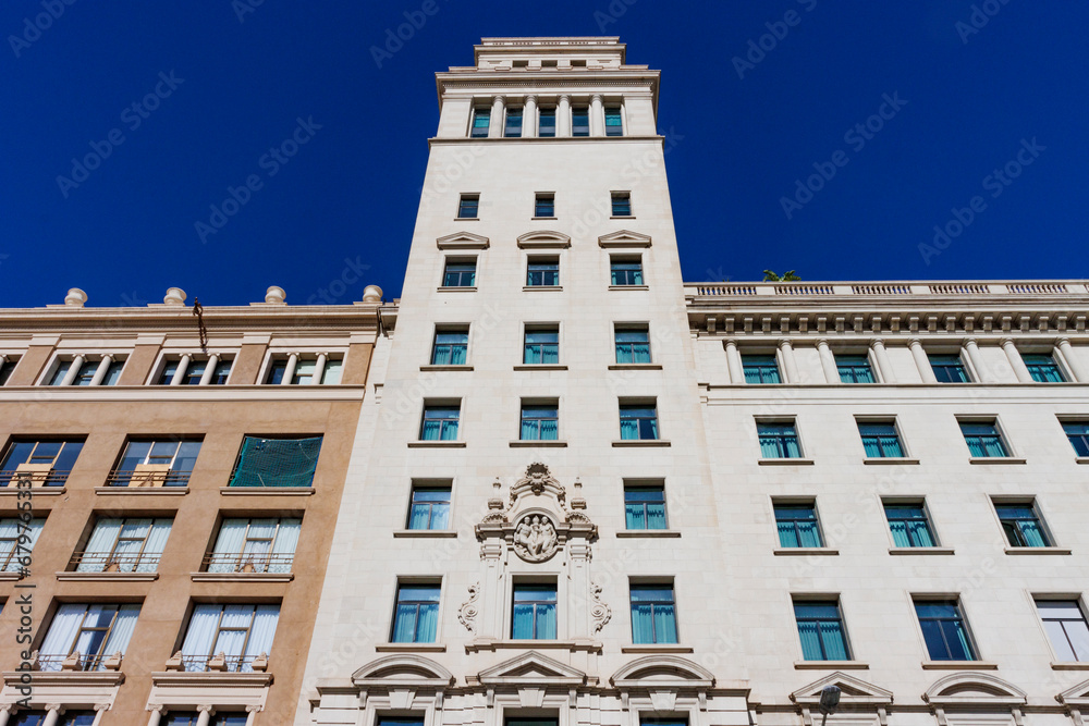 Obraz premium Facade of an old office building at plaza Catalunya square in Barcelona, Catalonia, Spain, Europe
