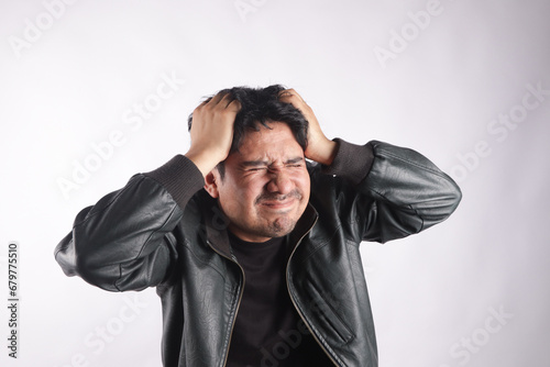 Photograph of person with headache. Concept of health and diseases.