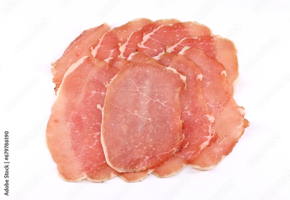 Slices of Lonzino on white background. It is a type of italian salumi  made of cured pork loin. - obrazy, fototapety, plakaty 