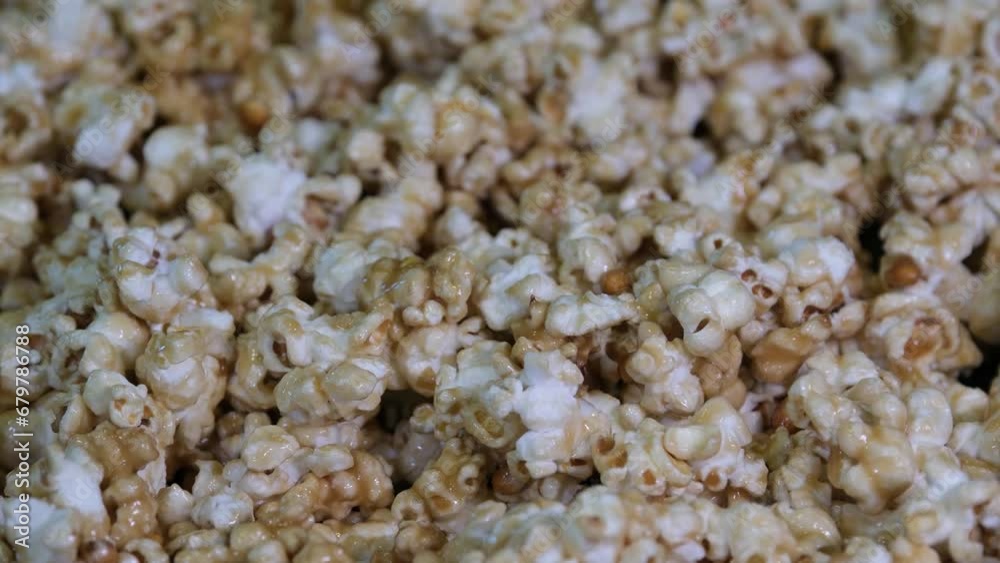 Popcorn fresh sweet caramel spins, cinema snacks. High quality 4k footage Popcorn fresh sweet caramel spins, cinema snacks. High quality 4k footage