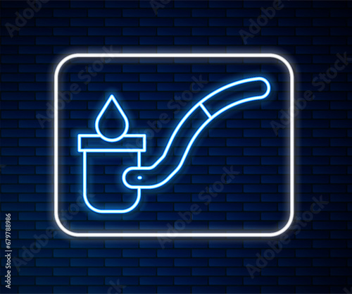 Glowing neon line Sauna ladle icon isolated on brick wall background. Vector