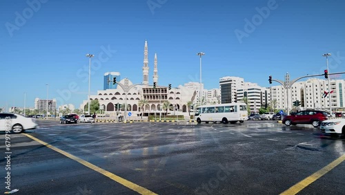 Rare Rainy Day View of Sharjah Traffic Signal Near King Faizal Mosque photo