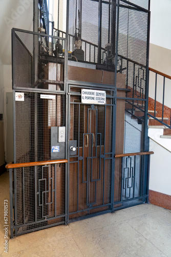 an old wooden elevator with metal gates