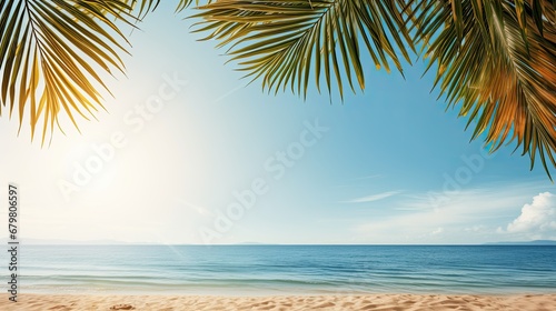 Beautiful wide panorama of a paradise beach with golden sand and palm leaves in blur. Summer banne