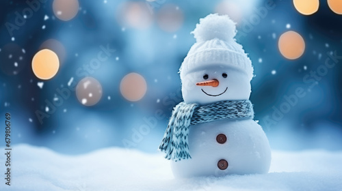 Snowman in the snow with bokeh lights background. Christmas and New Year concept.
