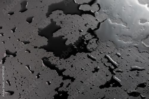 abstract background of wet black clean painted surface - close-up with selective focus